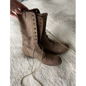 Valeria’s tan lace up boots with red zipper in back size 9.